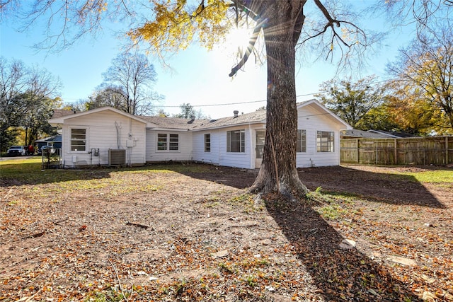 ranch-style home featuring a carport and a front yard