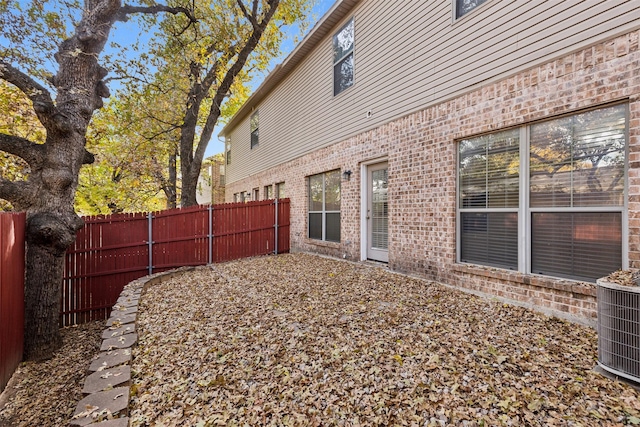 view of yard featuring central AC