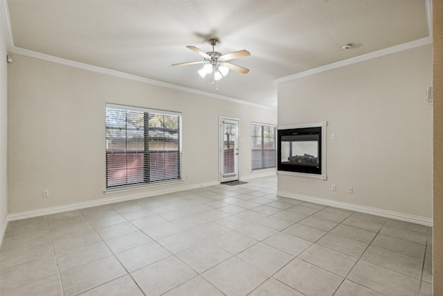 unfurnished living room with a wealth of natural light and ornamental molding