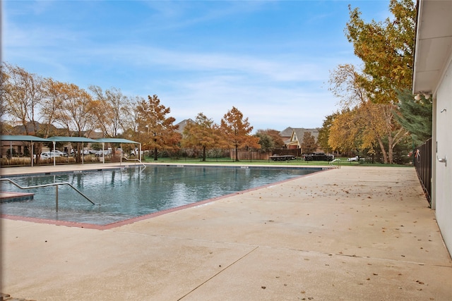 view of pool featuring a patio