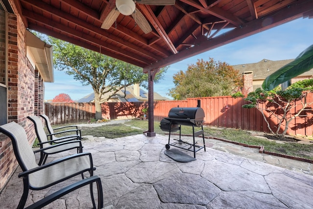 view of patio featuring ceiling fan and grilling area