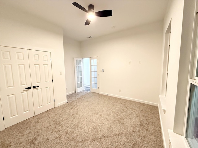 full bathroom with vanity, tile patterned floors, tiled shower / bath combo, and toilet