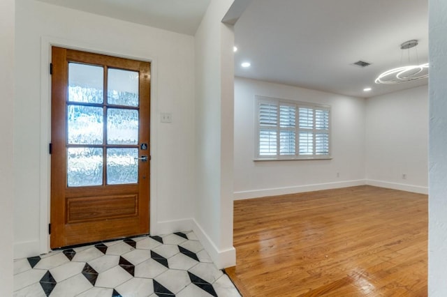 entryway with light wood-type flooring