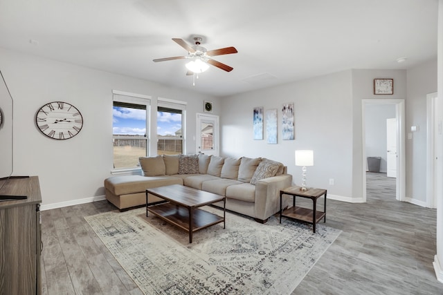 living room featuring ceiling fan