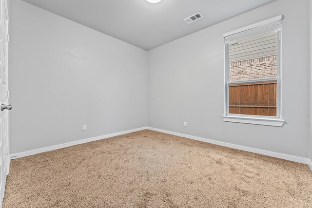 view of carpeted spare room