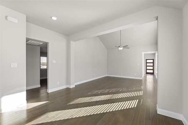 unfurnished living room with ceiling fan, dark hardwood / wood-style floors, and lofted ceiling