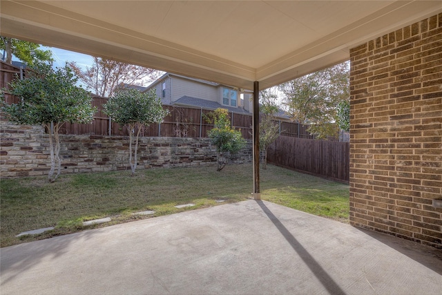 view of patio with a fenced backyard