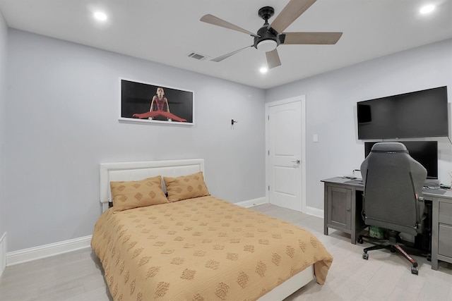 bedroom featuring light hardwood / wood-style flooring and ceiling fan