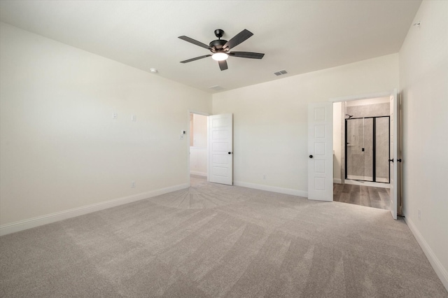 unfurnished bedroom with ceiling fan and light carpet