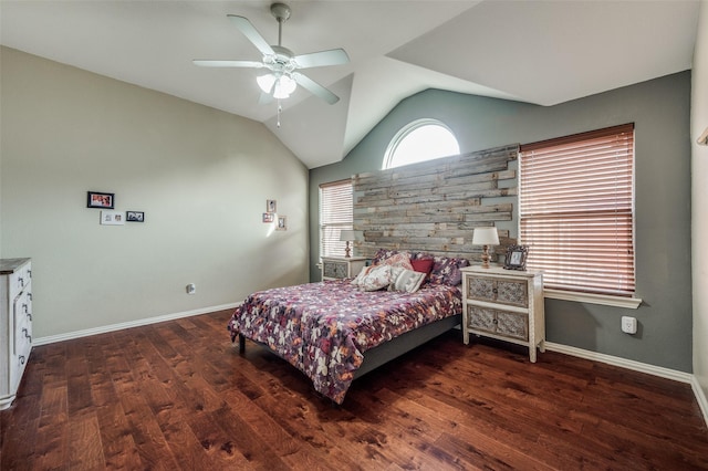 bedroom featuring vaulted ceiling, dark hardwood / wood-style floors, and ceiling fan