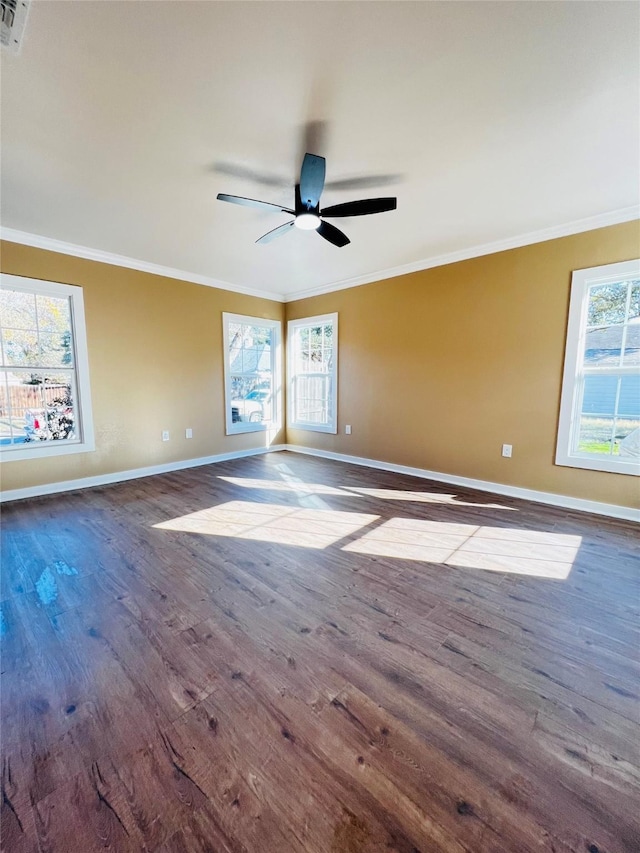 unfurnished room with crown molding, ceiling fan, and wood-type flooring