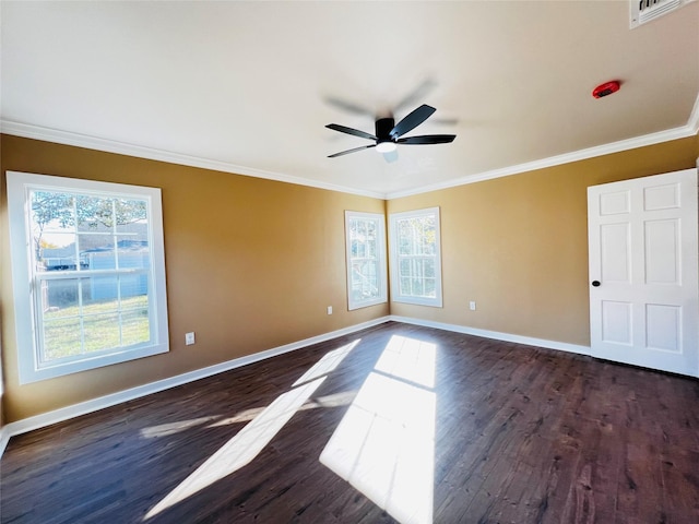 1601 Ficklin Ave, Corsicana, TX 75110 - unfurnished room with dark wood-type flooring, ceiling fan, ornamental molding, and a wealth of natural light