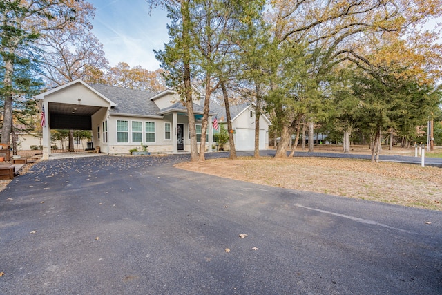 view of front of home with a carport