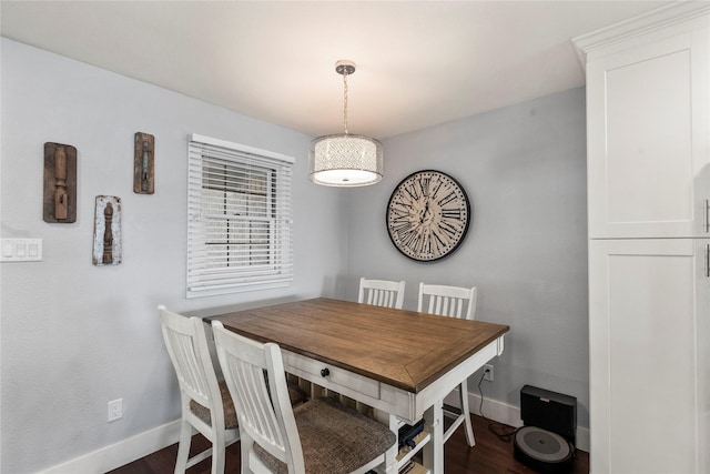 dining area with dark wood-type flooring