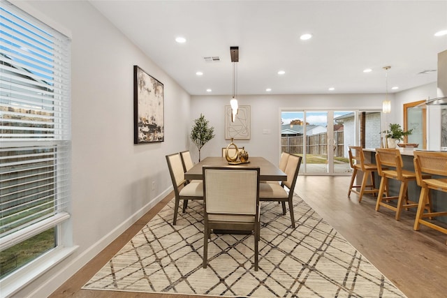 dining room featuring light wood-type flooring