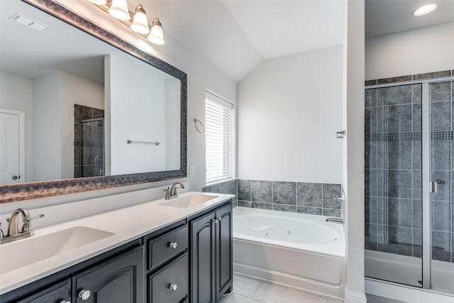 bathroom with vanity, tile patterned floors, separate shower and tub, and lofted ceiling