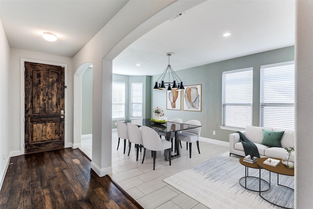 dining space featuring hardwood / wood-style flooring