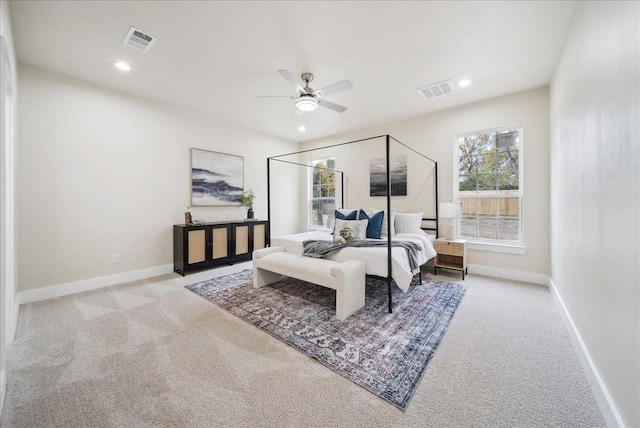 carpeted bedroom with ceiling fan