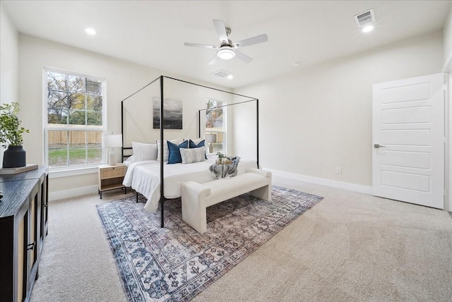 carpeted bedroom featuring ceiling fan