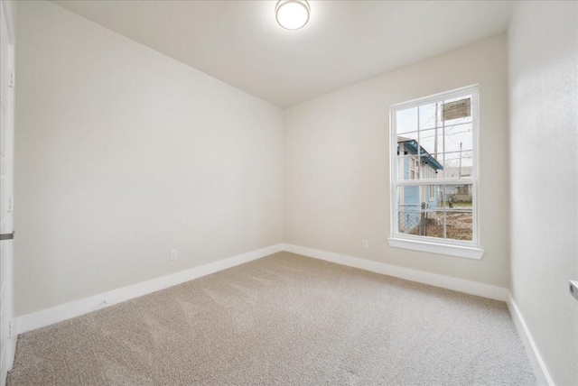 spare room with carpet floors