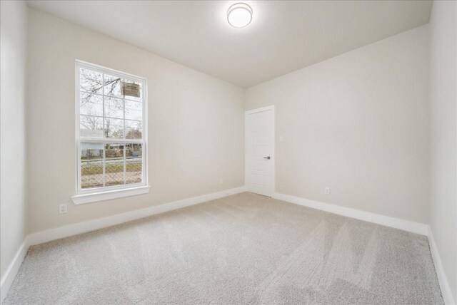 spare room with carpet floors