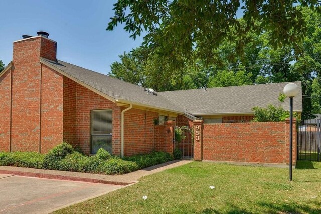 view of front of home with a front yard