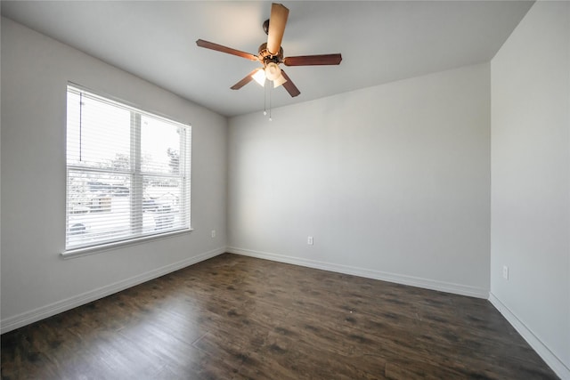 unfurnished room featuring ceiling fan and dark hardwood / wood-style flooring