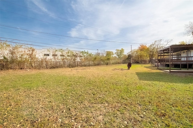 view of yard featuring a deck