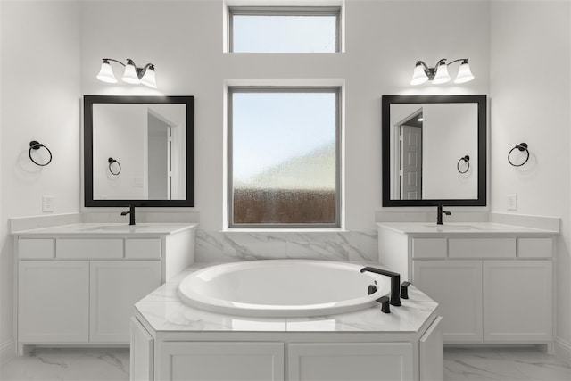 bathroom with vanity and a tub to relax in