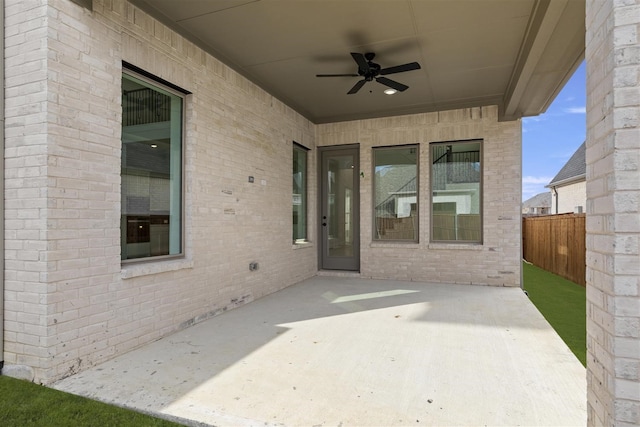 view of patio featuring ceiling fan