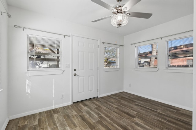 entryway featuring dark hardwood / wood-style floors and ceiling fan