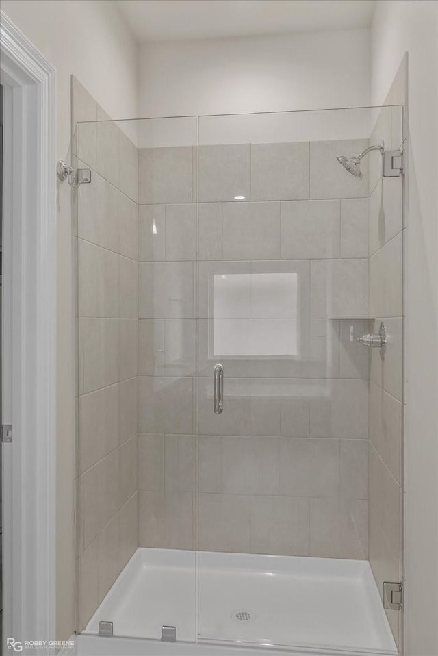 bathroom with walk in shower