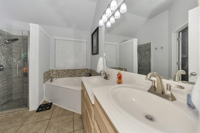 bathroom with plus walk in shower, vanity, tile patterned floors, and lofted ceiling