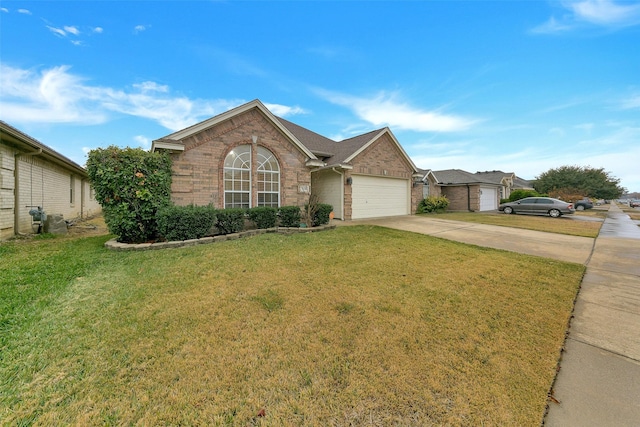 ranch-style house featuring a front lawn and a garage