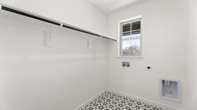 washroom with laundry area, baseboards, gas dryer hookup, hookup for a washing machine, and electric dryer hookup