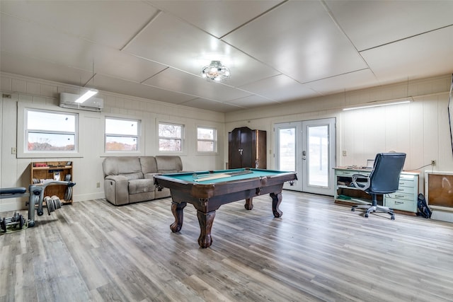 playroom featuring a healthy amount of sunlight, french doors, light hardwood / wood-style floors, and billiards