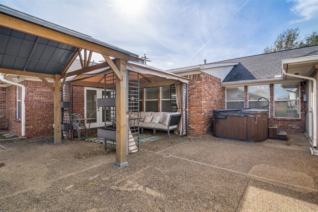 view of patio / terrace featuring a gazebo and an outdoor structure