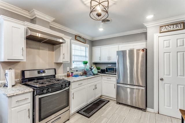 kitchen with white cabinets, wall chimney exhaust hood, light stone countertops, and appliances with stainless steel finishes