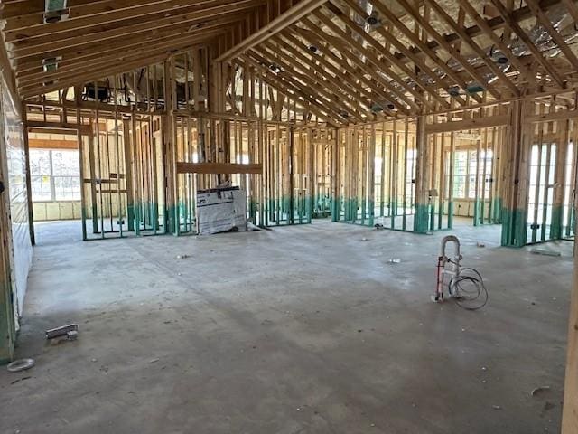 miscellaneous room featuring lofted ceiling