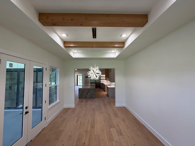 325 Ryker Ln, Gunter, TX 75058 - hallway with french doors, baseboards, a chandelier, light wood finished floors, and beam ceiling