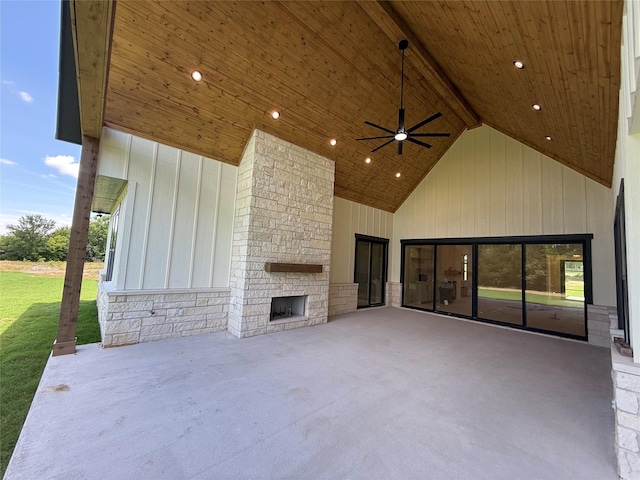 325 Ryker Ln, Gunter, TX 75058 - view of patio with an outdoor stone fireplace