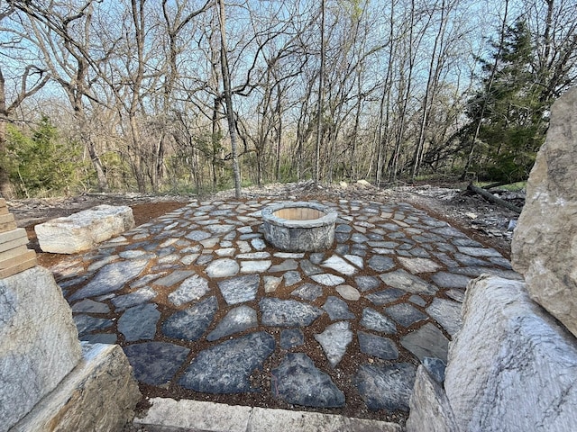 325 Ryker Ln, Gunter, TX 75058 - view of patio featuring an outdoor fire pit