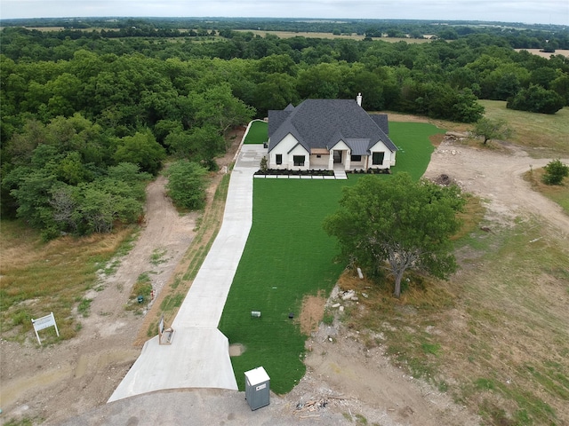 325 Ryker Ln, Gunter, TX 75058 - view from above of property with a forest
