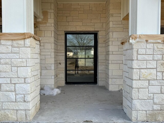 view of side of home with a yard