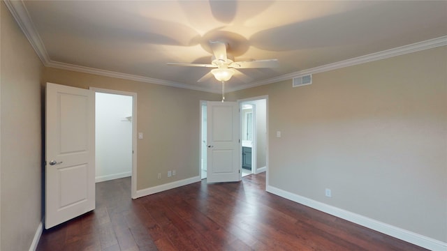 spare room with dark hardwood / wood-style flooring, ceiling fan, and ornamental molding