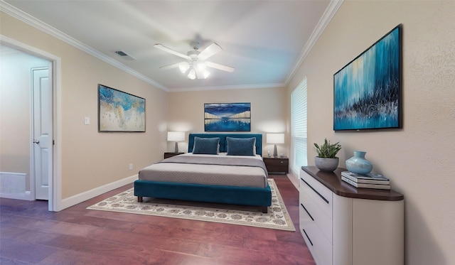 bedroom featuring ceiling fan, dark hardwood / wood-style flooring, and crown molding