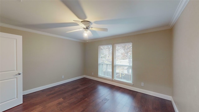 spare room featuring dark hardwood / wood-style flooring, ceiling fan, and crown molding