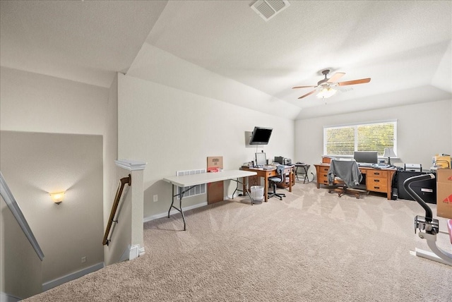 home office featuring carpet flooring, ceiling fan, a textured ceiling, and lofted ceiling