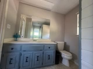 bathroom with vanity and toilet