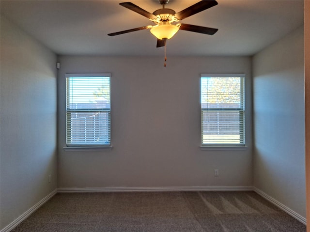 carpeted empty room with ceiling fan